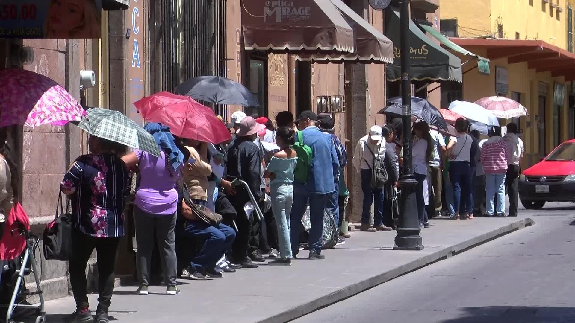fila de personas